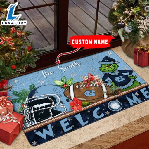 NCAA North Carolina Tar Heels Grinch Christmas Welcome  Football Doormat – Custom Name